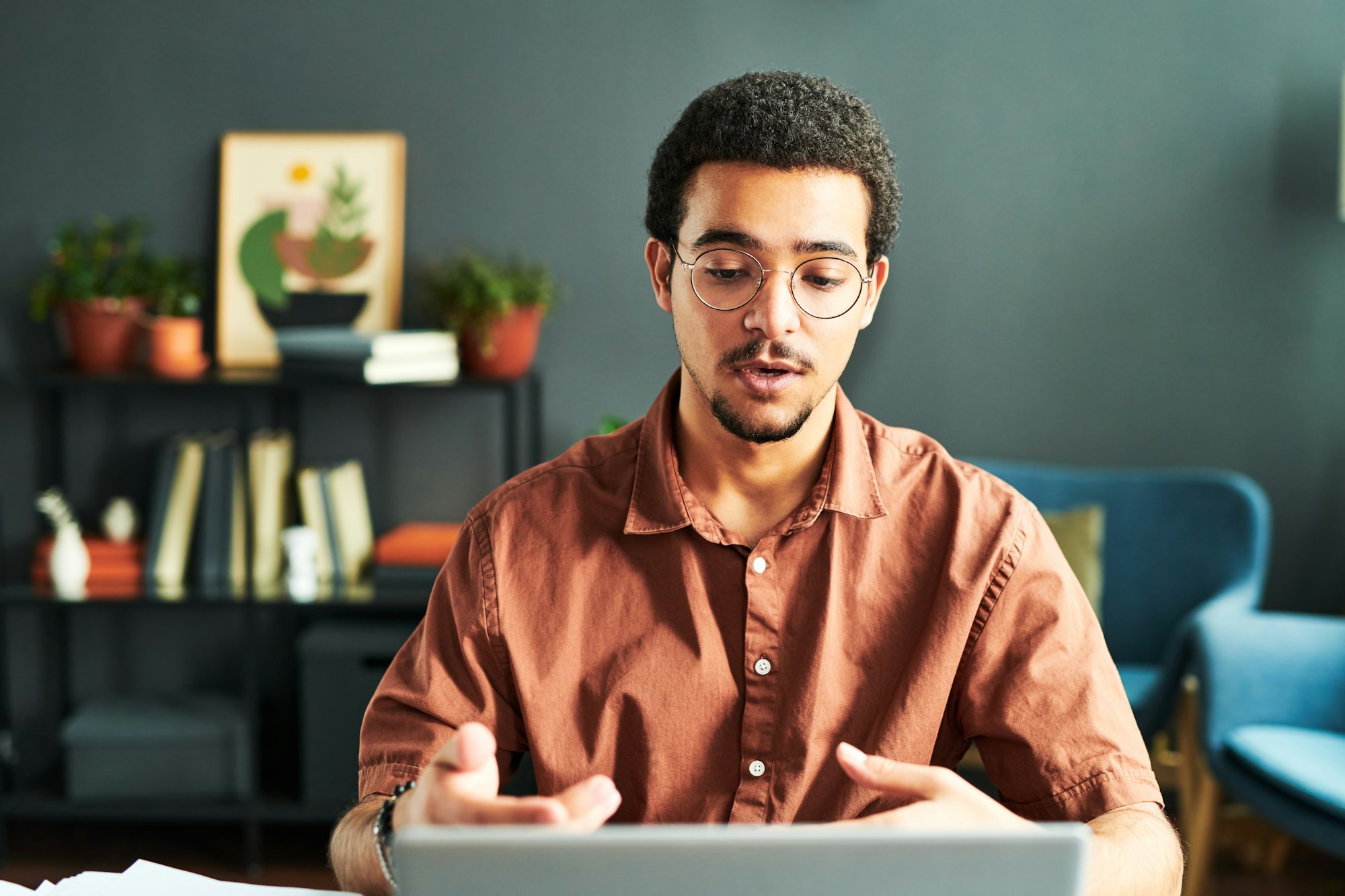 Young businessman or online student communicating with online audience